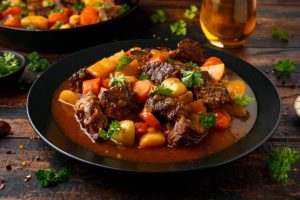 beef stew, hearty stew, classic beef stew, comfort food, savory stew, tender beef, rich broth, rustic bowl, warm meal, winter recipe, beef and vegetable stew, slow-cooked beef, homemade stew, cozy dinner, rustic recipe, wholesome food, beef stew recipe, hearty meal, beef chuck stew, stew with carrots, potatoes in stew, stew garnished with parsley, comfort dinner, slow-cooked recipe, one-pot meal, traditional beef stew, family dinner, beef stew with crusty bread, flavorful broth, hearty beef dish.