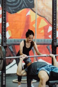spotting, weightlifting, strength training, gym safety, bench press, squat, overhead press, lifting partner, resistance training, fitness tips