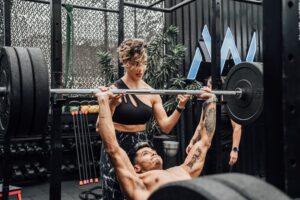 spotting, weightlifting, strength training, gym safety, bench press, squat, overhead press, lifting partner, resistance training, fitness tips